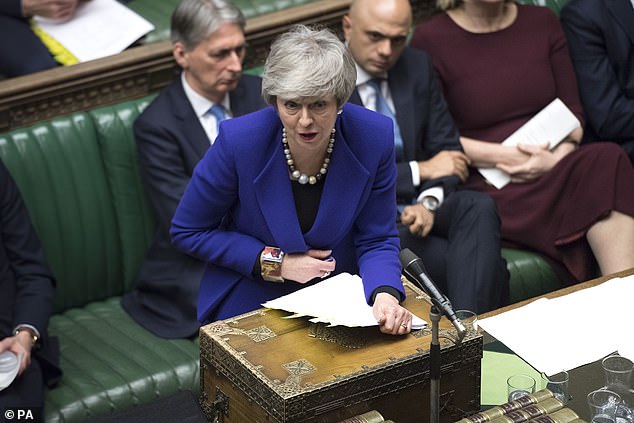 Theresa May (pictured at PMQs on Wednesday) has ordered officials to test the 'workability' of a Plan C for Brexit hatched by a group of Leave and Remain Tories