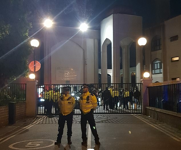Armed police have sealed off a mosque in London