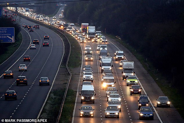 Pro-Brexit protesters make their point to motorists on the M5 in Devon with a rolling road block