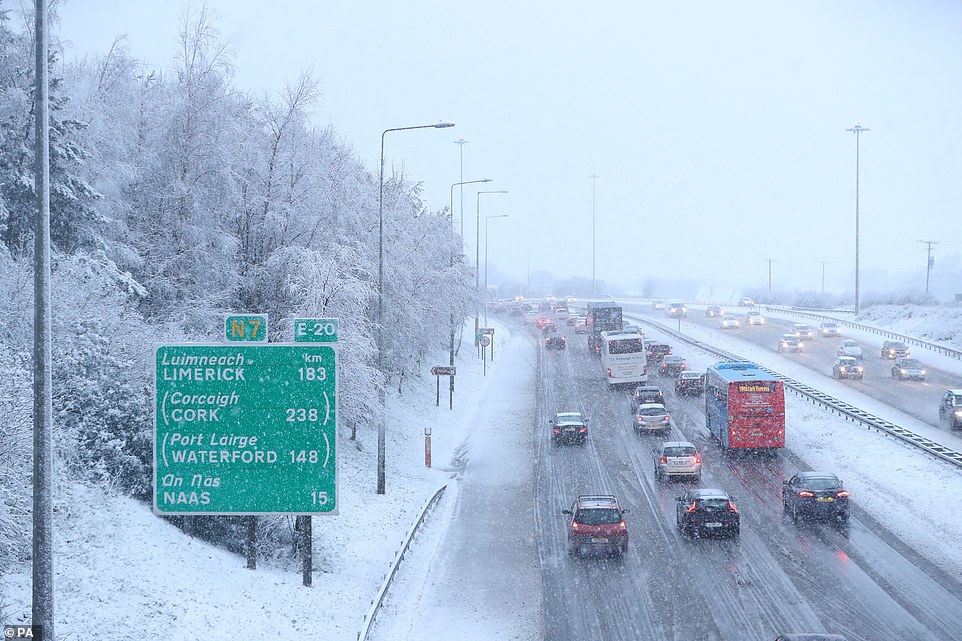 Snow and sleet was seen on the N7 in Dublin today as Storm Freya hit Ireland and cause widespread traffic disruptions