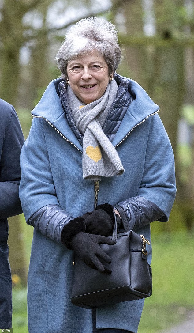 The Prime Minister, pictured leaving church today, warned MPs that they would need to back her deal if they wanted to avoid a delay to Article 50 or to avoid a no-deal situation