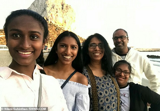 The family pictured together, from left- Tanya, Saumina, mother Nilani, Bumikka, and father Nagarajah