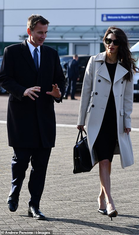 Jeremy Hunt, pictured with Amal Clooney today,