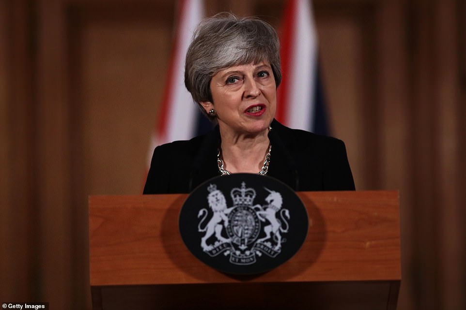 Theresa May (pictured tonight in Downing Street) admitted Brexit would