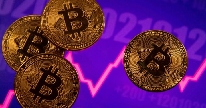 Bitcoin slumps 14% as a pullback from record gathers pace